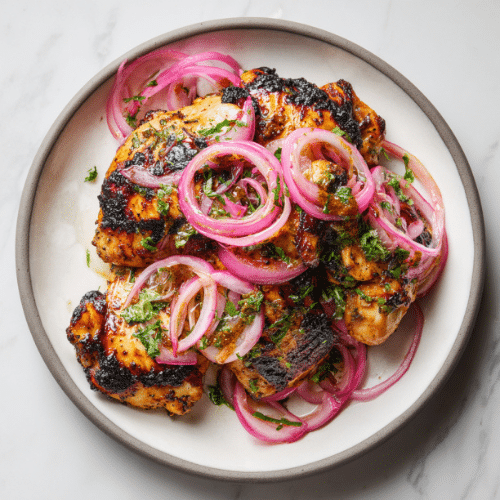 Grilled Spiced Chicken Thighs with Pickled Red Onion