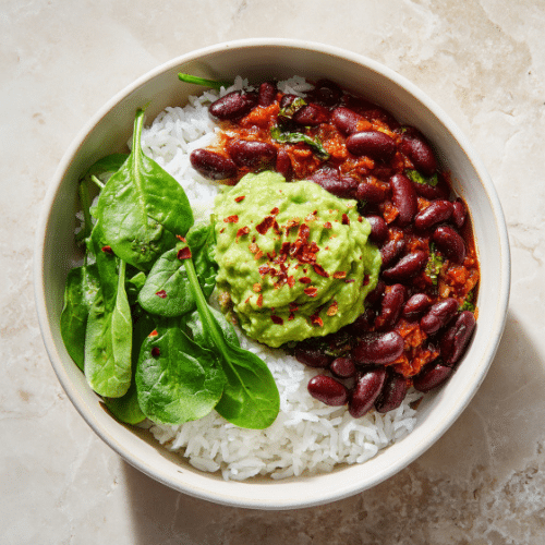 Vegan Bean Chili Bowl with Rice, Spinach & Guacamole