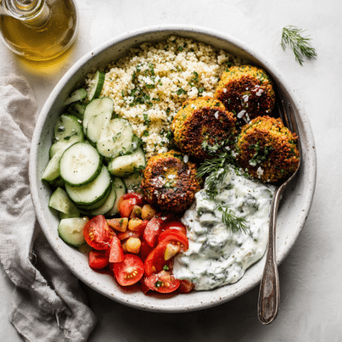 Mediterranean Falafel Bowl with Herbed Couscous & Tzatziki