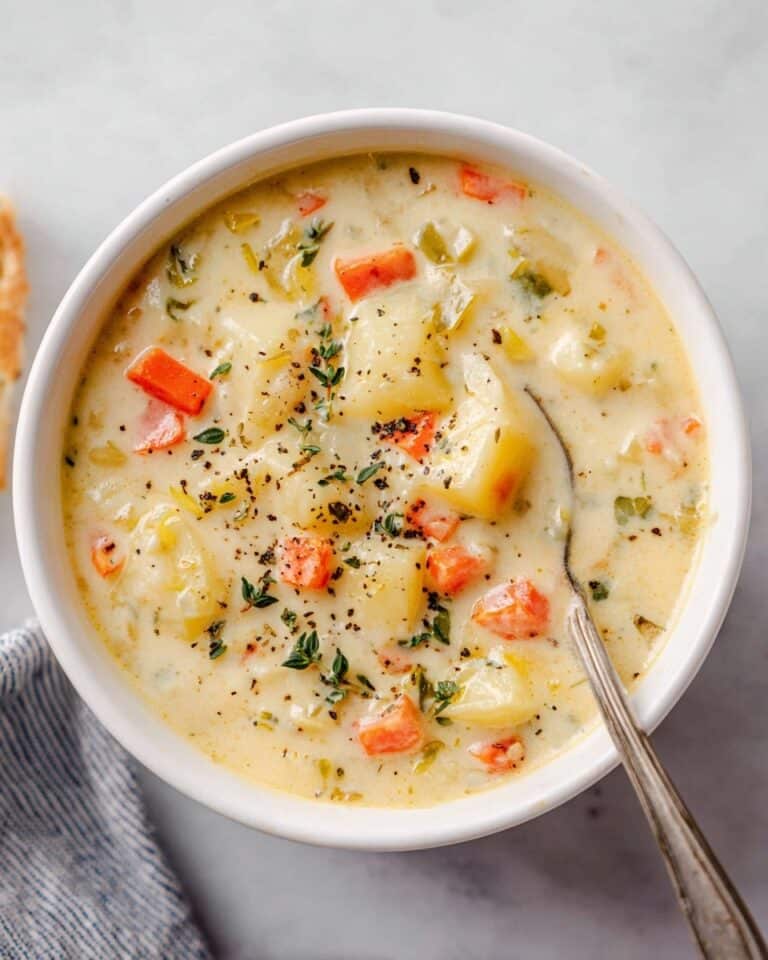 Creamy Cauliflower Soup with Cheddar and Fresh Herbs Recipe