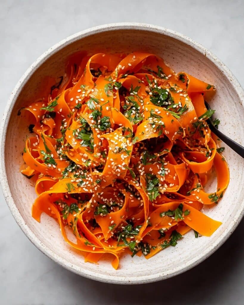 Raw Carrot Salad with Lime, Sesame, and Herbal Notes Recipe