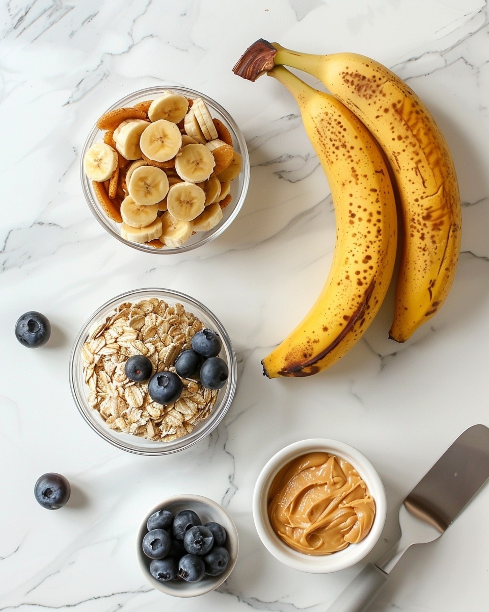 A single white plate holding one oatmeal blueberry cookie with visible plump blueberries bursting with juice, close-up angle capturing the crumbly, textured oatmeal cookie base and the moist interior with juicy fruit pockets, crumbs scattered artfully around, set on a white marble surface with natural lighting, styled as a ready-to-eat snack from a food blog, photo taken with an iphone --ar 4:5 --v 7