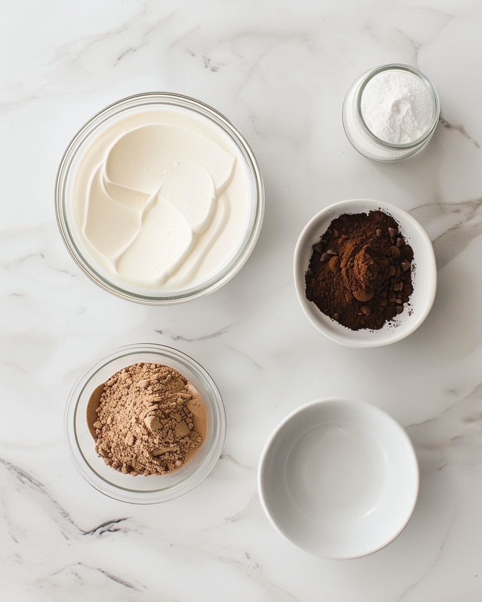 Single white ramekin filled with a rich and creamy chocolate mousse, topped with delicate chocolate shavings and a sprinkle of flaky sea salt, close-up angled shot emphasizing the smooth, airy texture and subtle peaks of the mousse, set on a white marble surface with natural lighting, styled as a ready-to-eat individual dessert portion, photo taken with an iphone --ar 4:5 --v 7