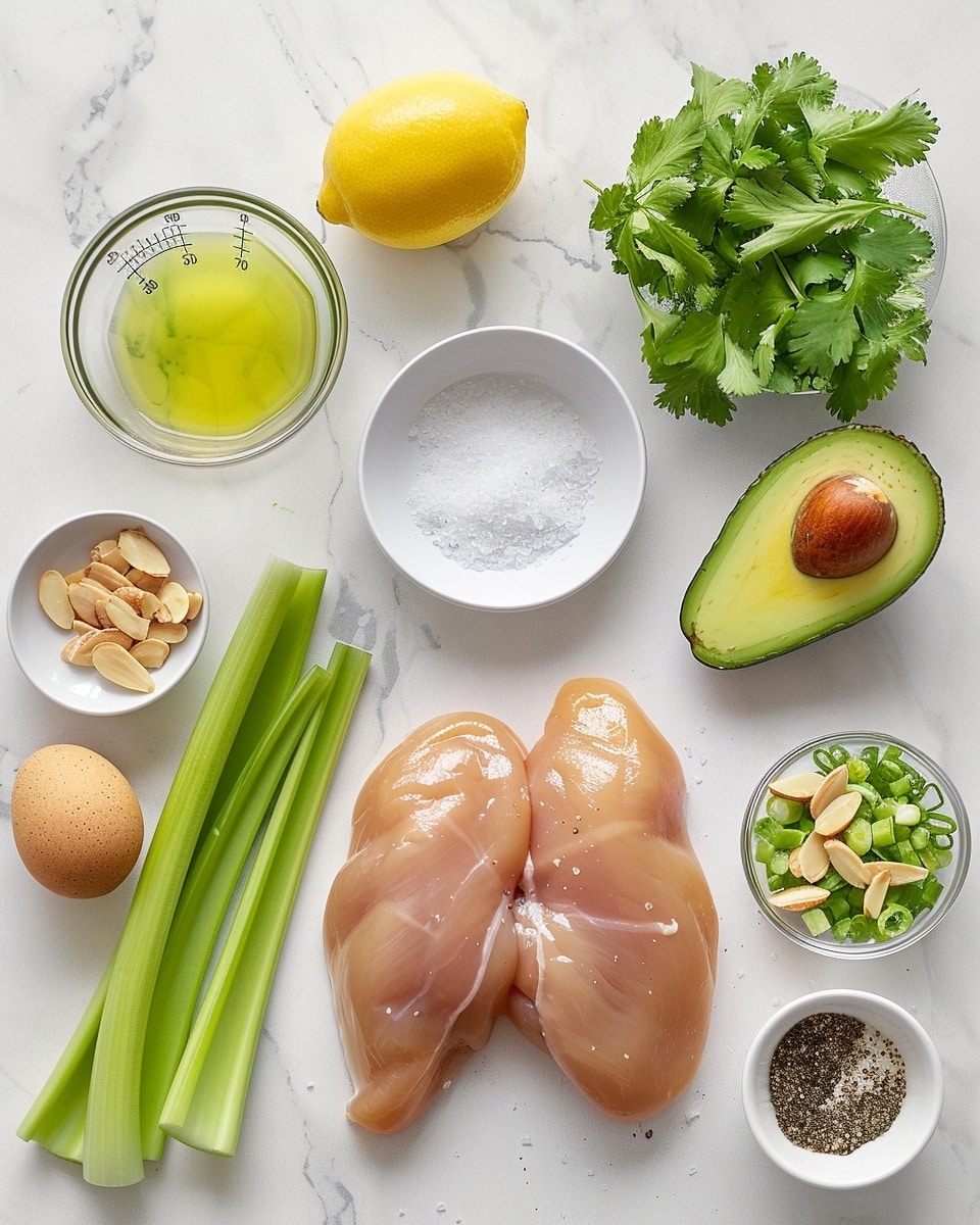 Close-up of a single white bowl filled with a fresh serving of shredded chicken mixed with vibrant chopped celery, green onions, and creamy avocado chunks, lightly seasoned with black pepper, showcasing a bright green and white contrast, natural texture and moisture visible in the chicken and avocado, garnished with small cilantro leaves on a pristine white marble surface, natural lighting highlighting the freshness and color, styled as an intimate plated serving ready to eat photo taken with an iphone --ar 4:5 --v 7