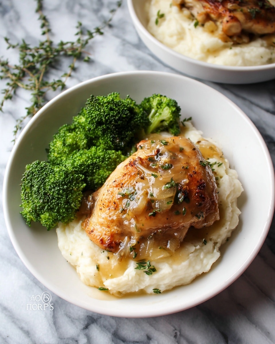 Large white stainless steel skillet filled with golden seared chicken breasts simmering in rich creamy garlic sauce, loaded with tender diced onions, whole garlic cloves, and fresh parsley sprinkled on top, whole dish shown from a 3/4 angle over a white marble countertop, natural sunlight enhancing the creamy texture and golden crust, professional food magazine hero shot photo taken with an iphone --ar 4:5 --v 7
