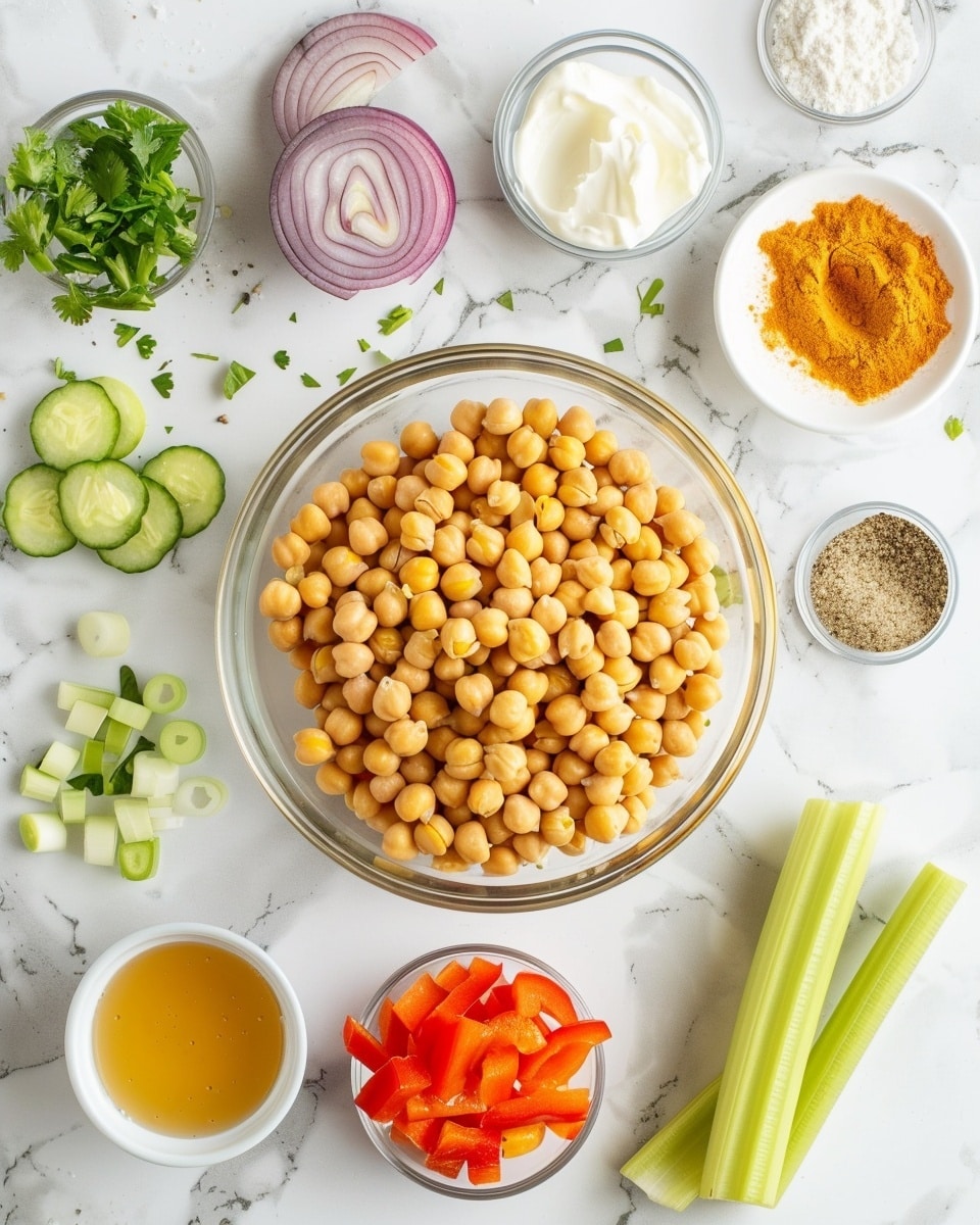 Single white bowl holding a close-up serving of creamy chickpea salad with noticeable chunks of red bell pepper, finely chopped fresh herbs, and bits of celery, coated in a golden turmeric-spiced dressing, garnished with a small sprig of cilantro on top, vibrant colors and textures clearly visible, placed on white marble surface with natural lighting, intimate plated serving photo taken with an iphone --ar 4:5 --v 7