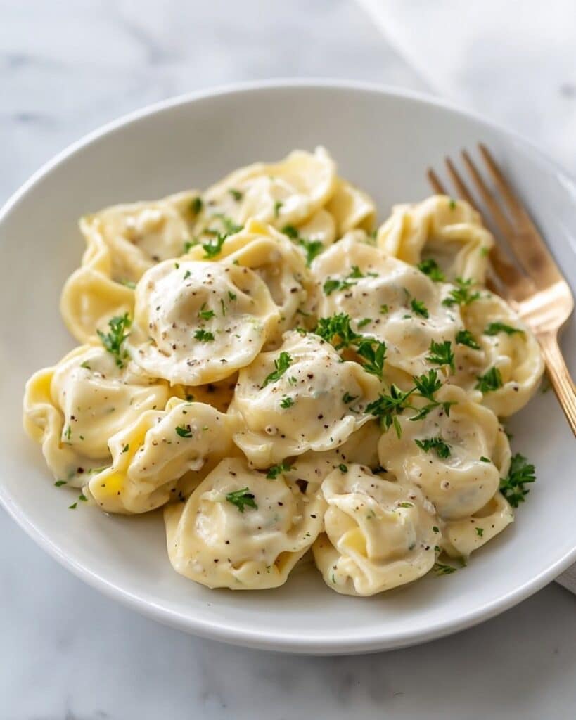 Creamy Parmesan and Asiago Tortellini with Herb Garlic Sauce Recipe