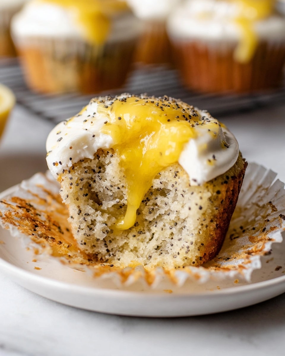 A full dozen of lemon poppy seed cupcakes arranged neatly on a large white rectangular serving platter, each cupcake topped with smooth white frosting and a swirl of glossy lemon curd, sprinkled lightly with black poppy seeds, the cupcakes showcasing moist speckled cake beneath the frosting, whole presentation photographed from a 3/4 angle on a white marble countertop with natural lighting, styled like a professional food magazine hero shot photo taken with an iphone --ar 4:5 --v 7